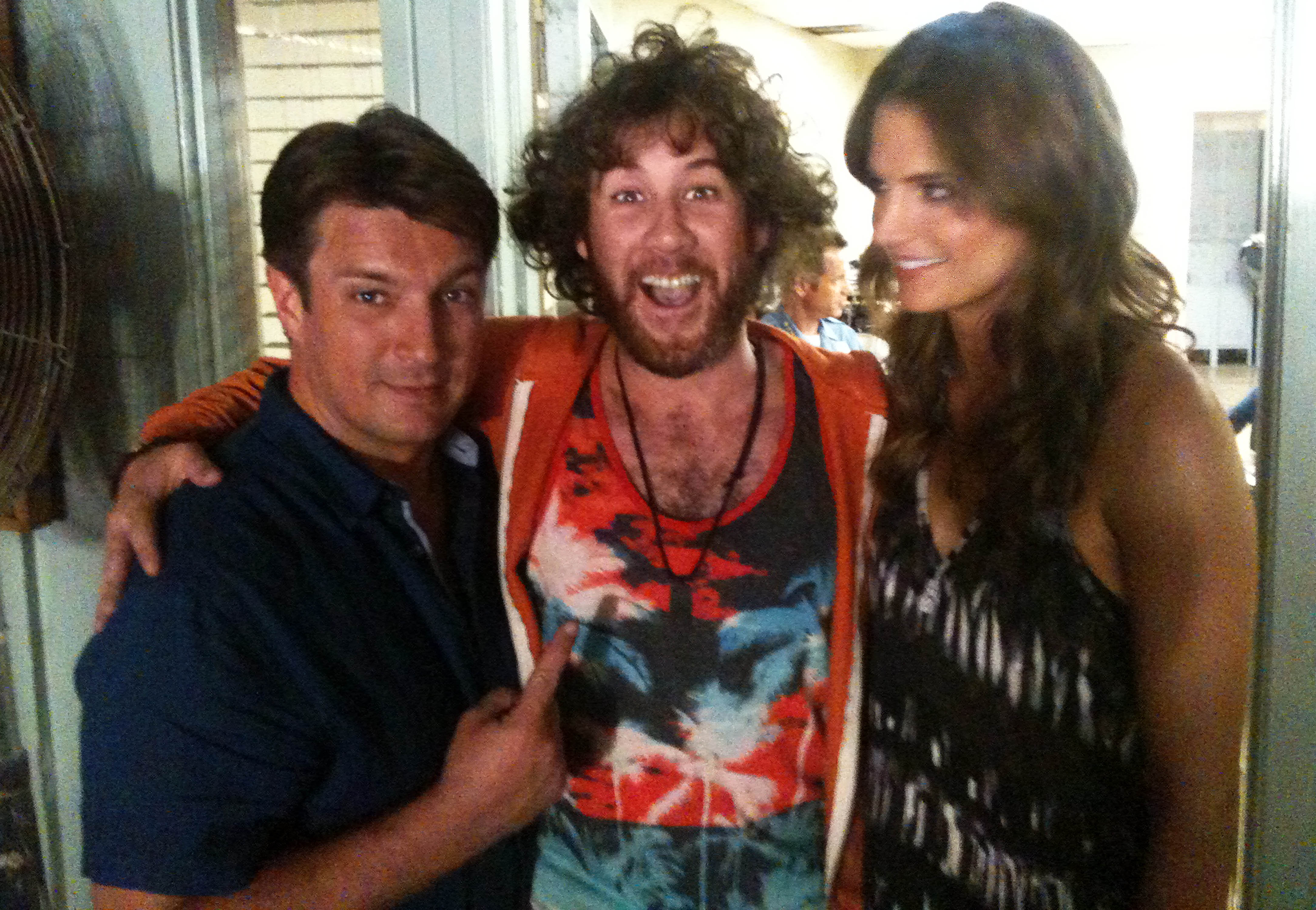 JR Nutt on the set of Castle with Nathan Fillion and Stana Katic