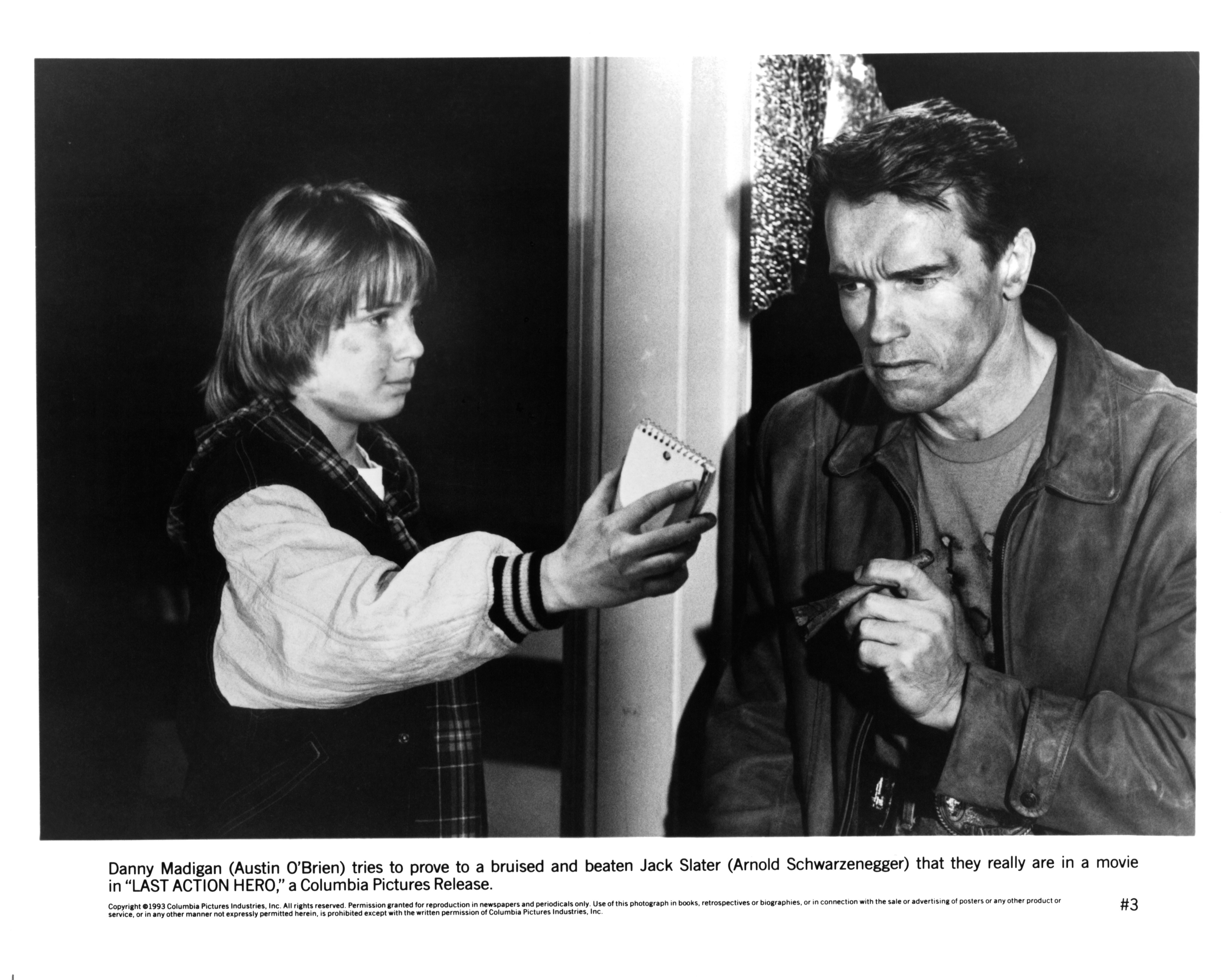 Still of Arnold Schwarzenegger and Austin O'Brien in Last Action Hero (1993)
