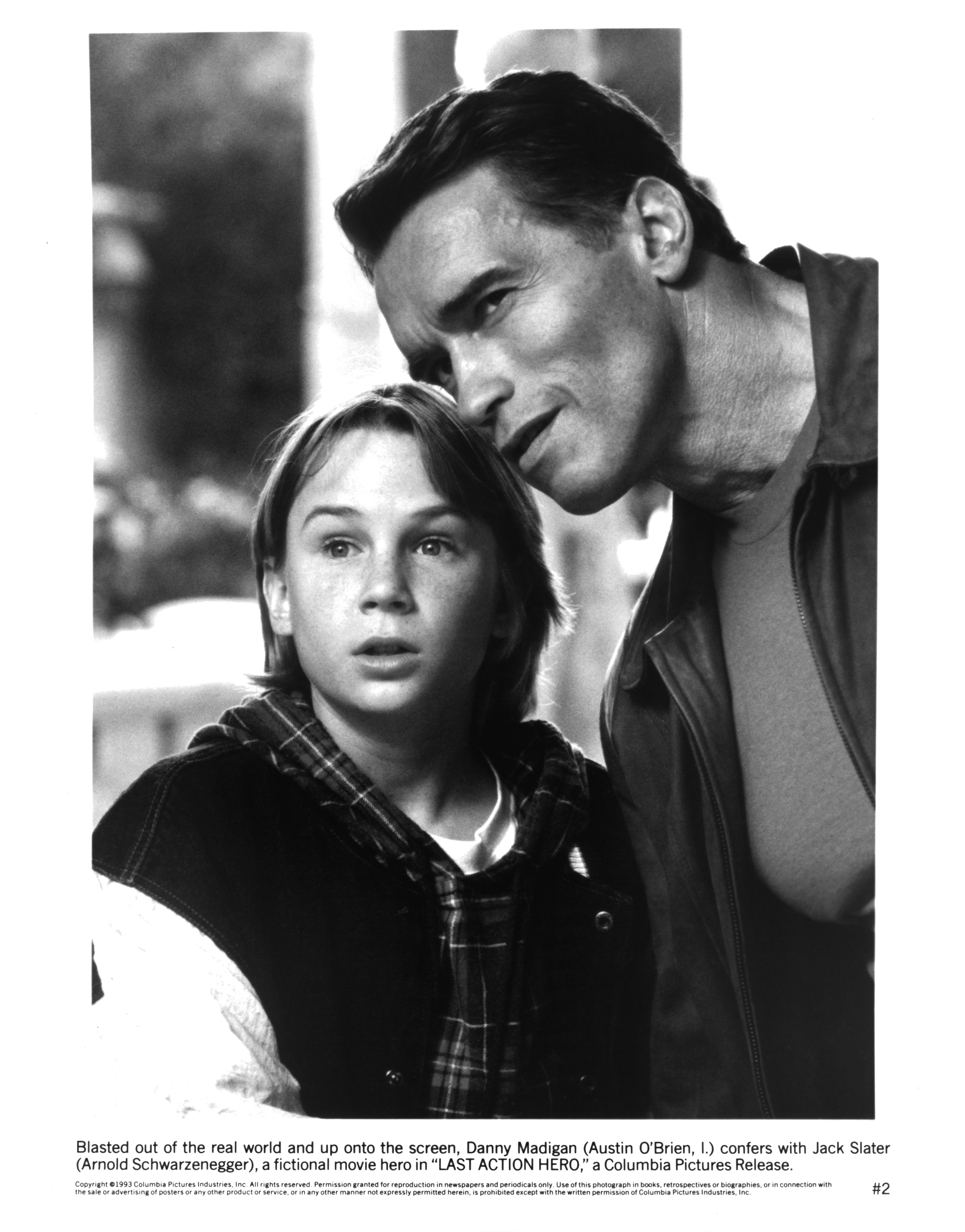 Still of Arnold Schwarzenegger and Austin O'Brien in Last Action Hero (1993)