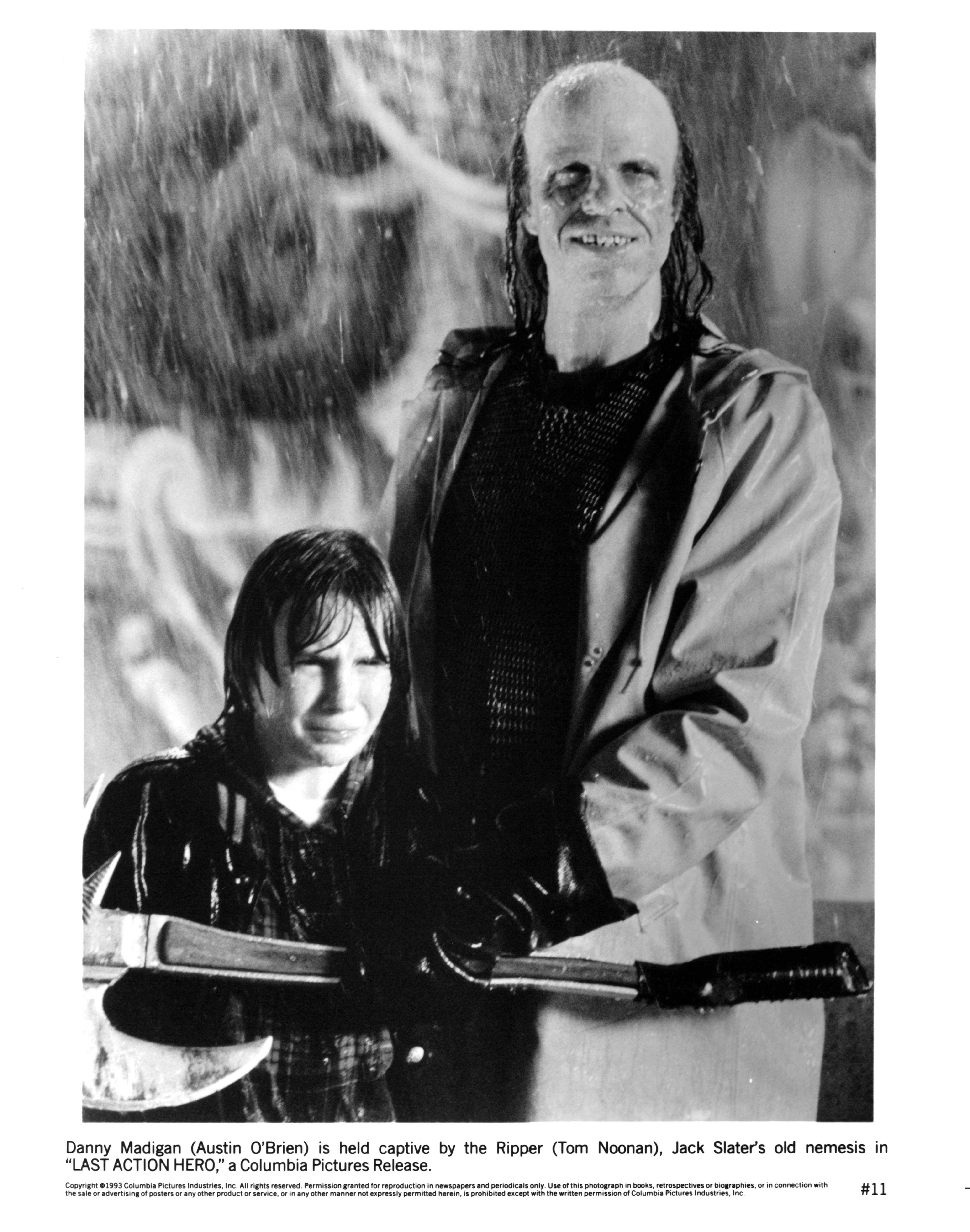 Still of Tom Noonan and Austin O'Brien in Last Action Hero (1993)