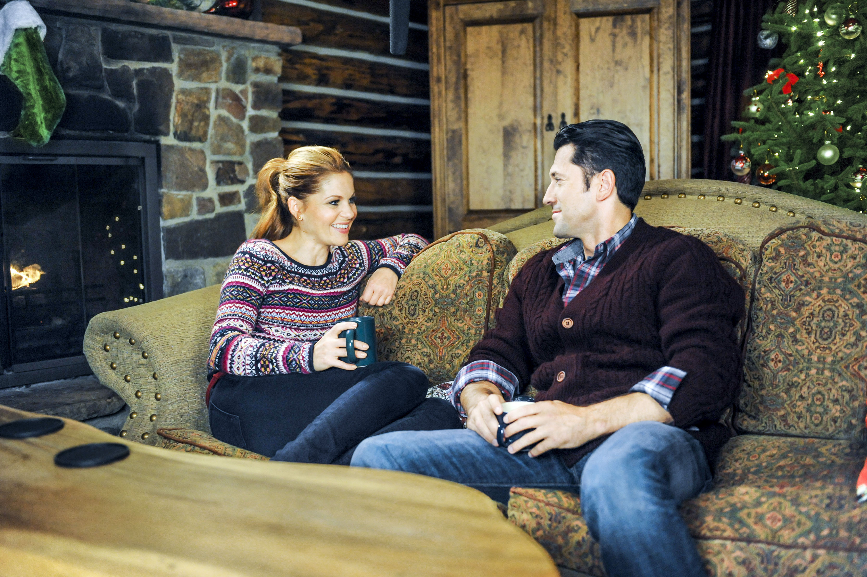 Still of Candace Cameron Bure and David O'Donnell in Christmas Under Wraps (2014)