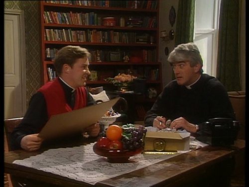 Still of Dermot Morgan and Ardal O'Hanlon in Father Ted (1995)
