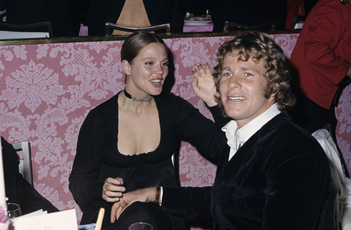 Ryan O'Neal and Leigh Taylor-Young circa 1970s