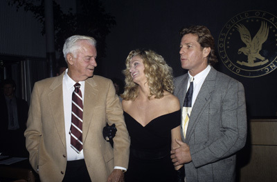 Farrah Fawcett, her father James and Ryan O'Neal at a screening for the television mini-series 