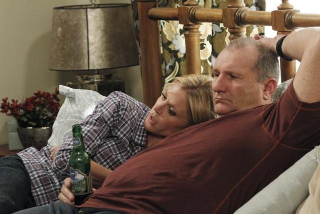 Still of Julie Bowen and Ed O'Neill in Moderni seima (2009)