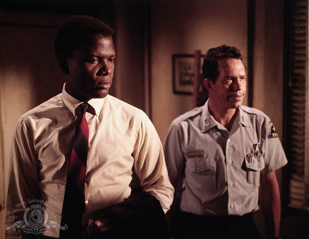 Still of Sidney Poitier and Warren Oates in In the Heat of the Night (1967)