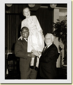 Colonel Barney Oldfield and his wife Vada with George Foreman