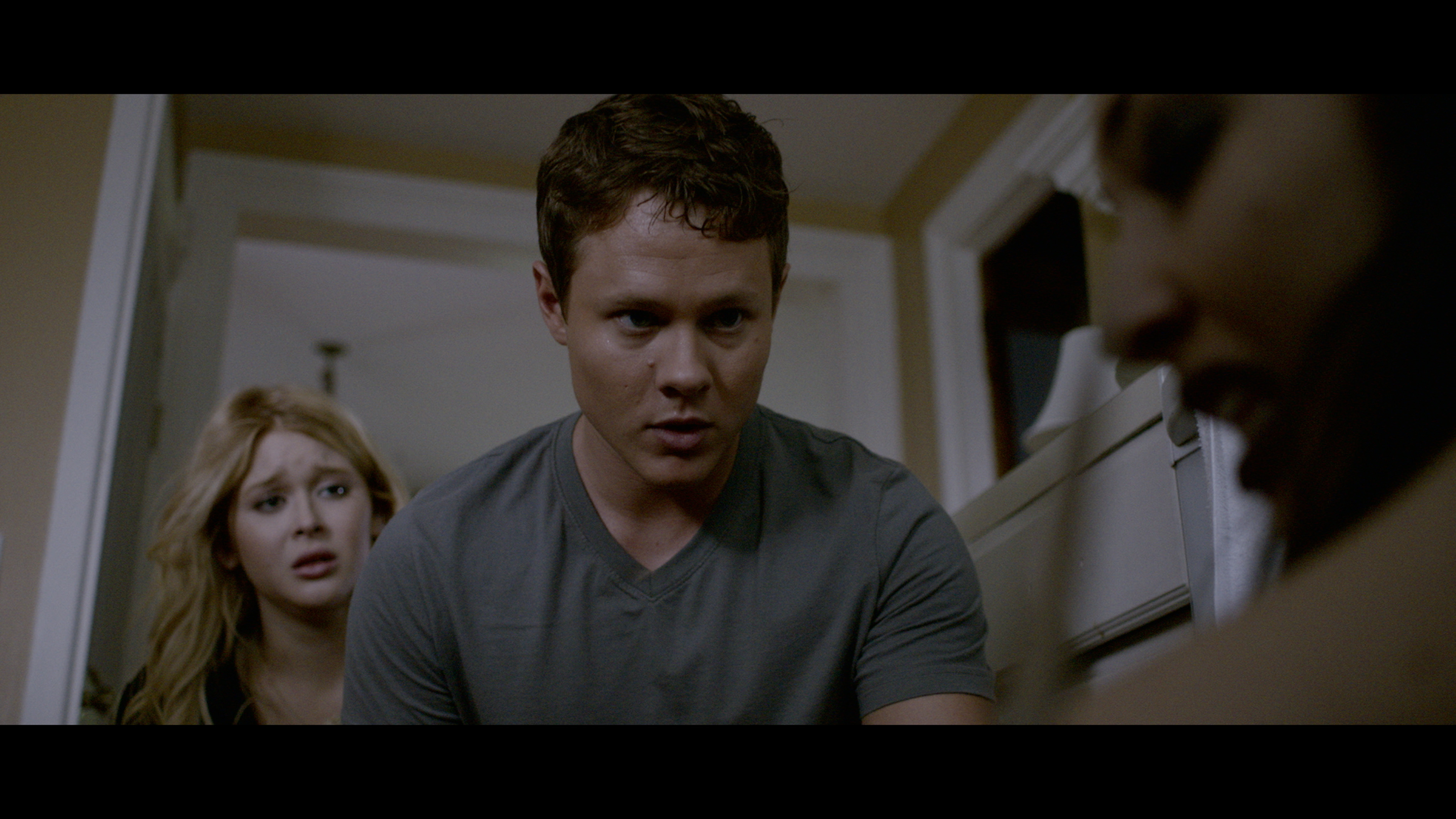 Still of Renee Olstead and Guy Wilson in The Midnight Game (2013)