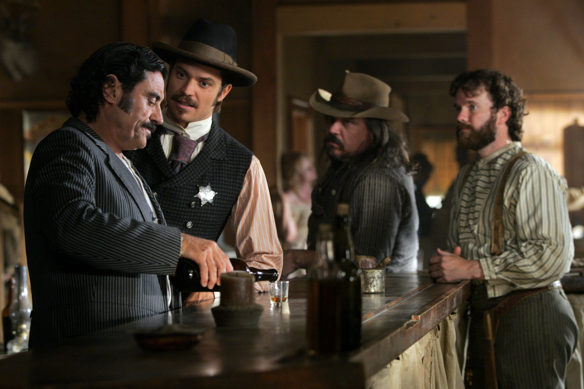 Still of Sean Bridgers, W. Earl Brown, Ian McShane and Timothy Olyphant in Deadwood (2004)