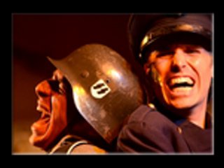 Paestum-Templi/Il Racconto delle Pietre/festival 2011/ Giuseppe Mortelliti(soldato nazista)ed Emanuele Banchio(poliziotto americano)in una scena drammatica di