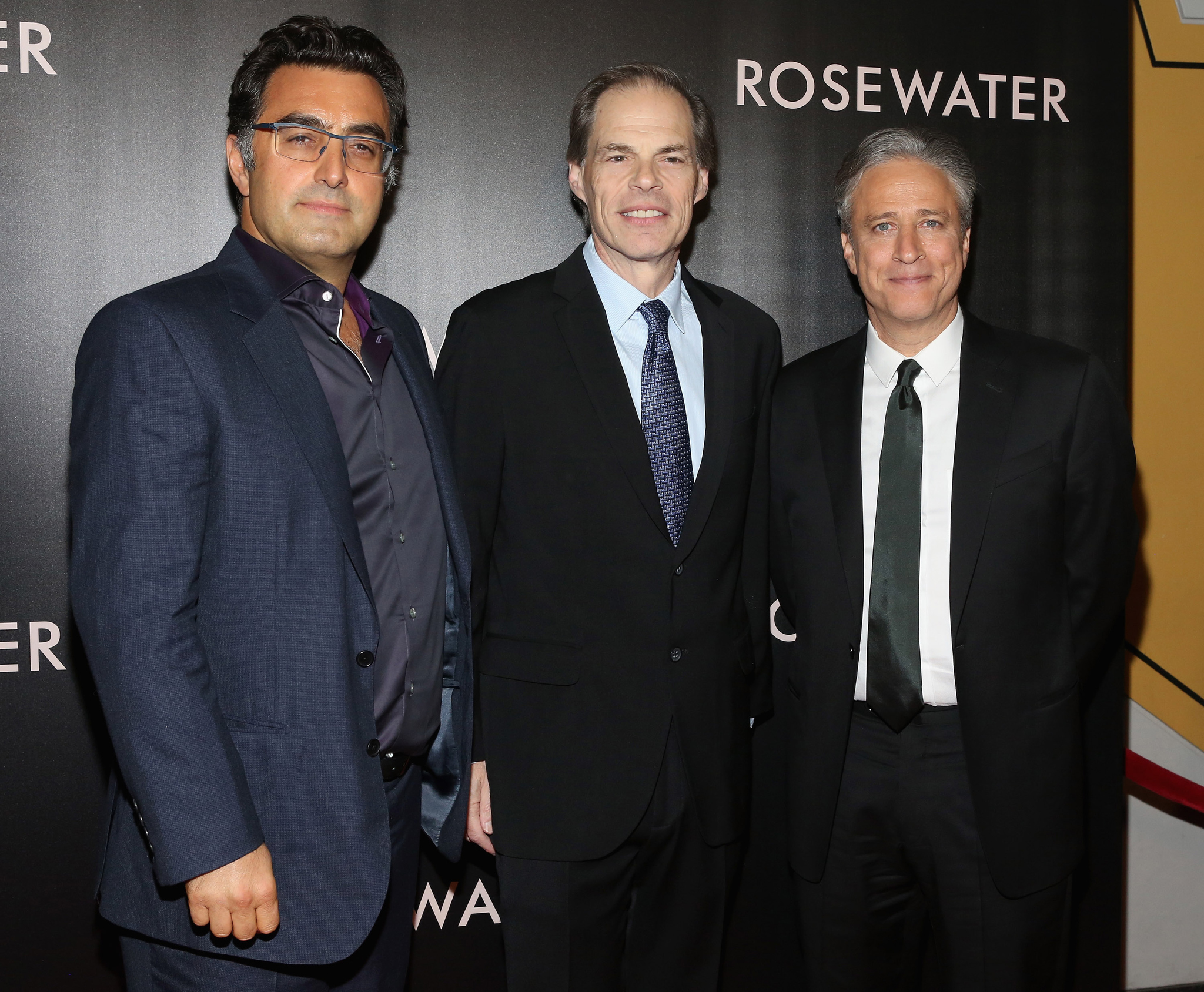 Maziar Bahari, Tom Ortenberg and Jon Stewart at event of Rosewater (2014)