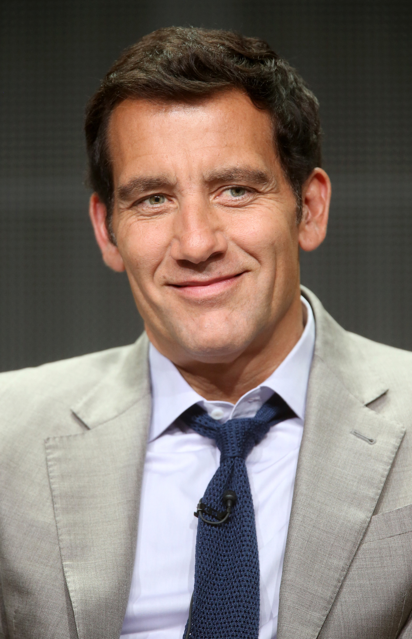 Actor Clive Owen speaks onstage at the 