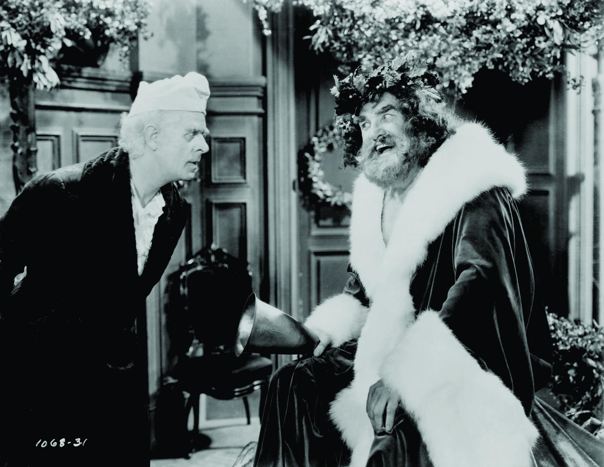 Still of Lionel Braham and Reginald Owen in A Christmas Carol (1938)