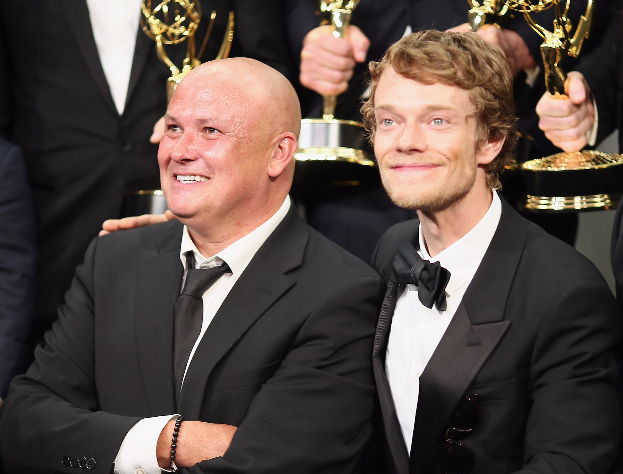 Conleth Hill and Alfie Allen at event of The 67th Primetime Emmy Awards (2015)