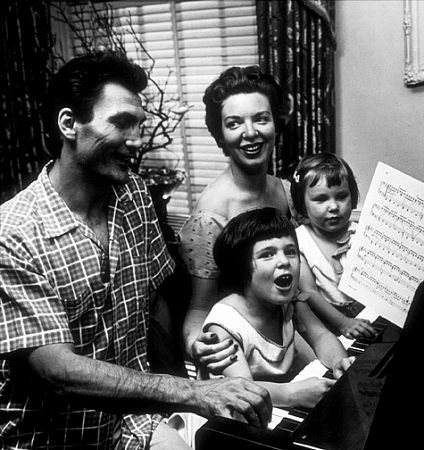 Jack Palance with his wife, Virginia, and daughters, Holly and Brooke, at home in Beverly Hills, CA, 1954.