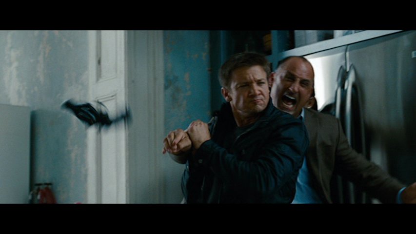 Michael Papajohn and Jeremy Renner in The Bourne Legacy