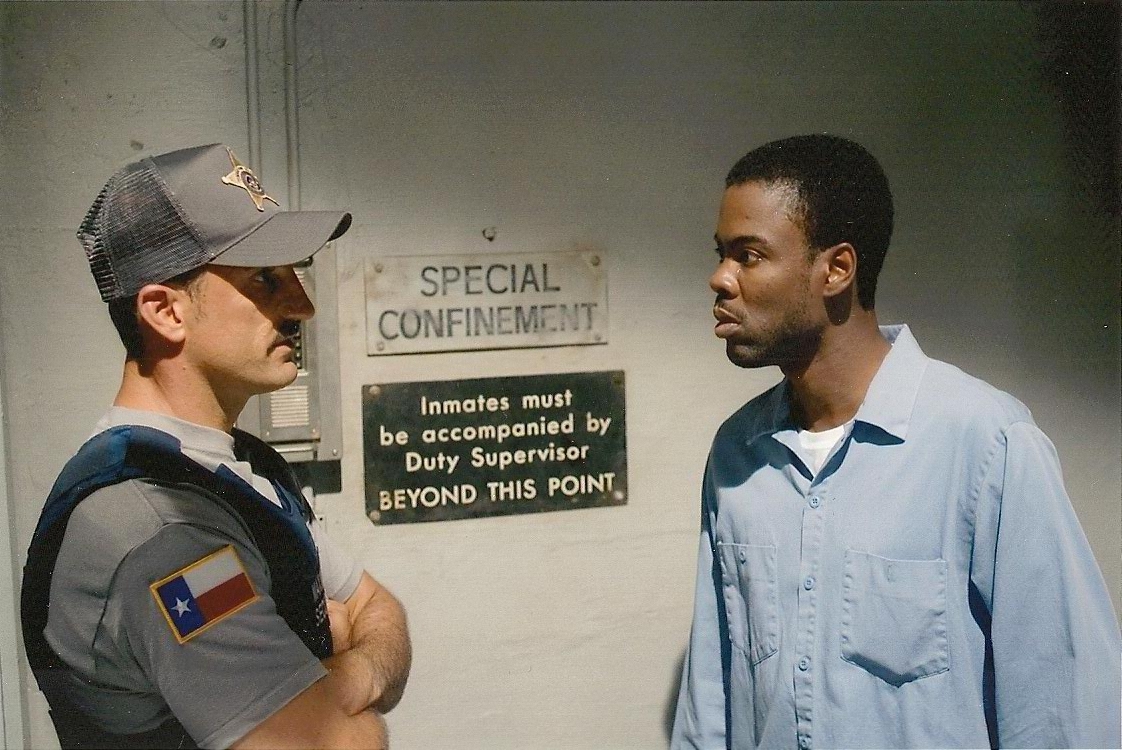 Michael Papajohn and Chris Rock in The Longest Yard