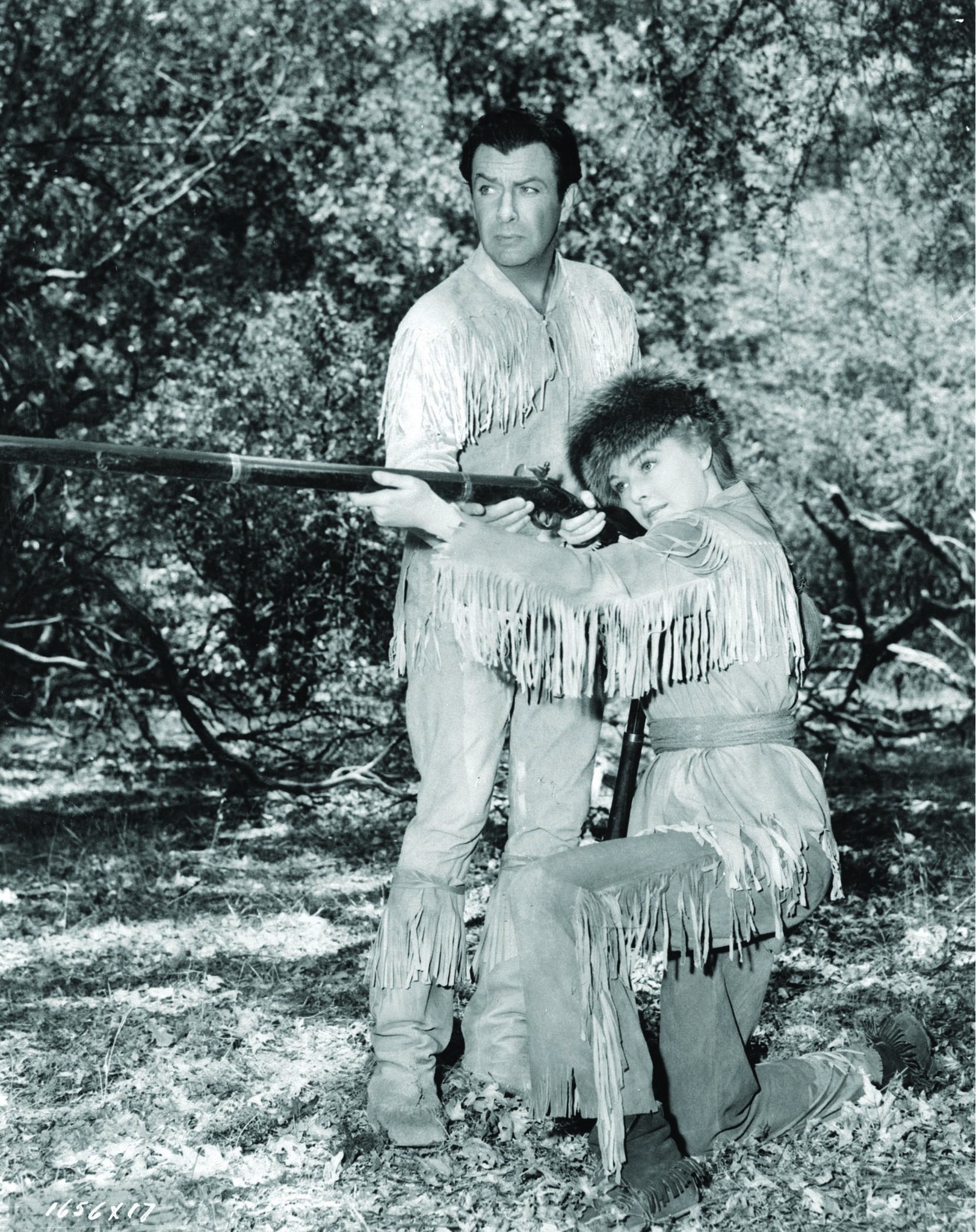 Still of Robert Taylor and Eleanor Parker in Many Rivers to Cross (1955)