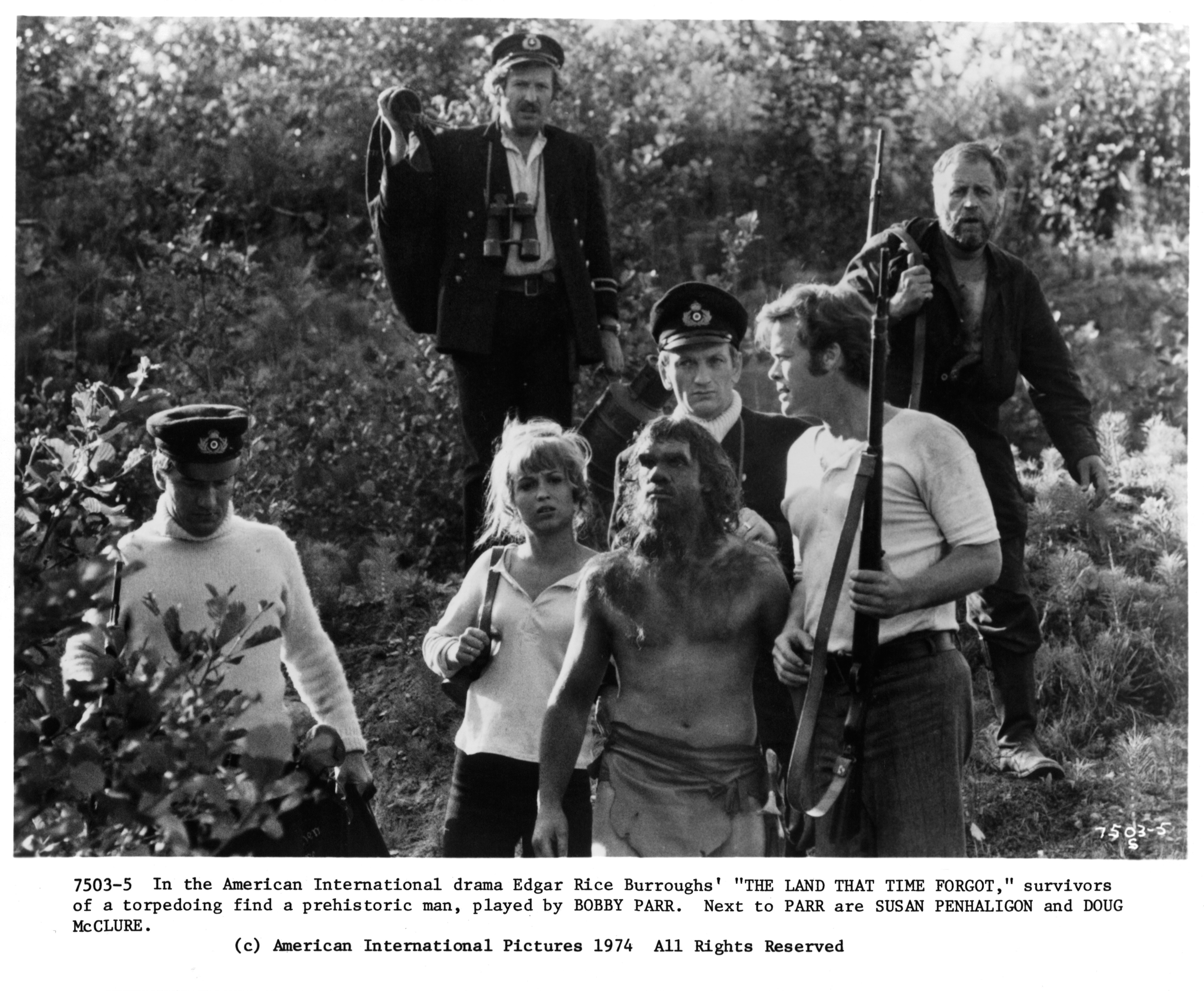 Still of Doug McClure, Bobby Parr and Susan Penhaligon in The Land That Time Forgot (1975)