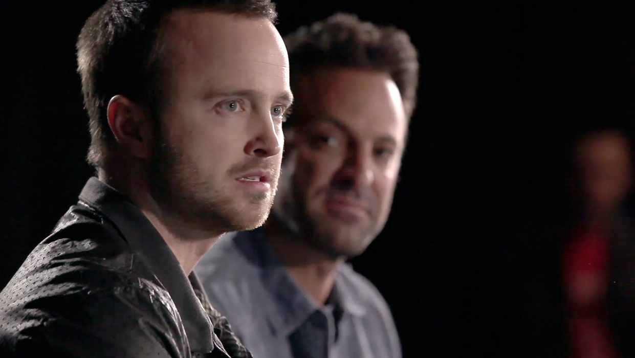 Still of Aaron Paul and Scott Waugh in Need for Speed. Istroske greicio (2014)