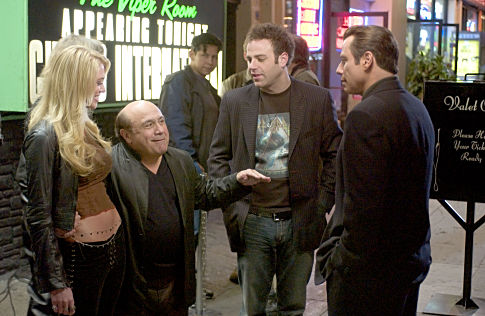 Martin Weir (DANNY DeVITO) introduces music producer Hy Gordon (PAUL ADELSTEIN) to Chili Palmer (JOHN TRAVOLTA) in MGM Pictures' comedy BE COOL.