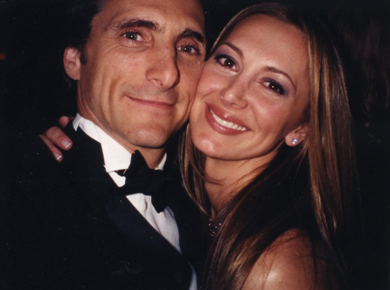 Producer Lawrence Bender with actress Natasha Pavlovich at an Oscar's after party
