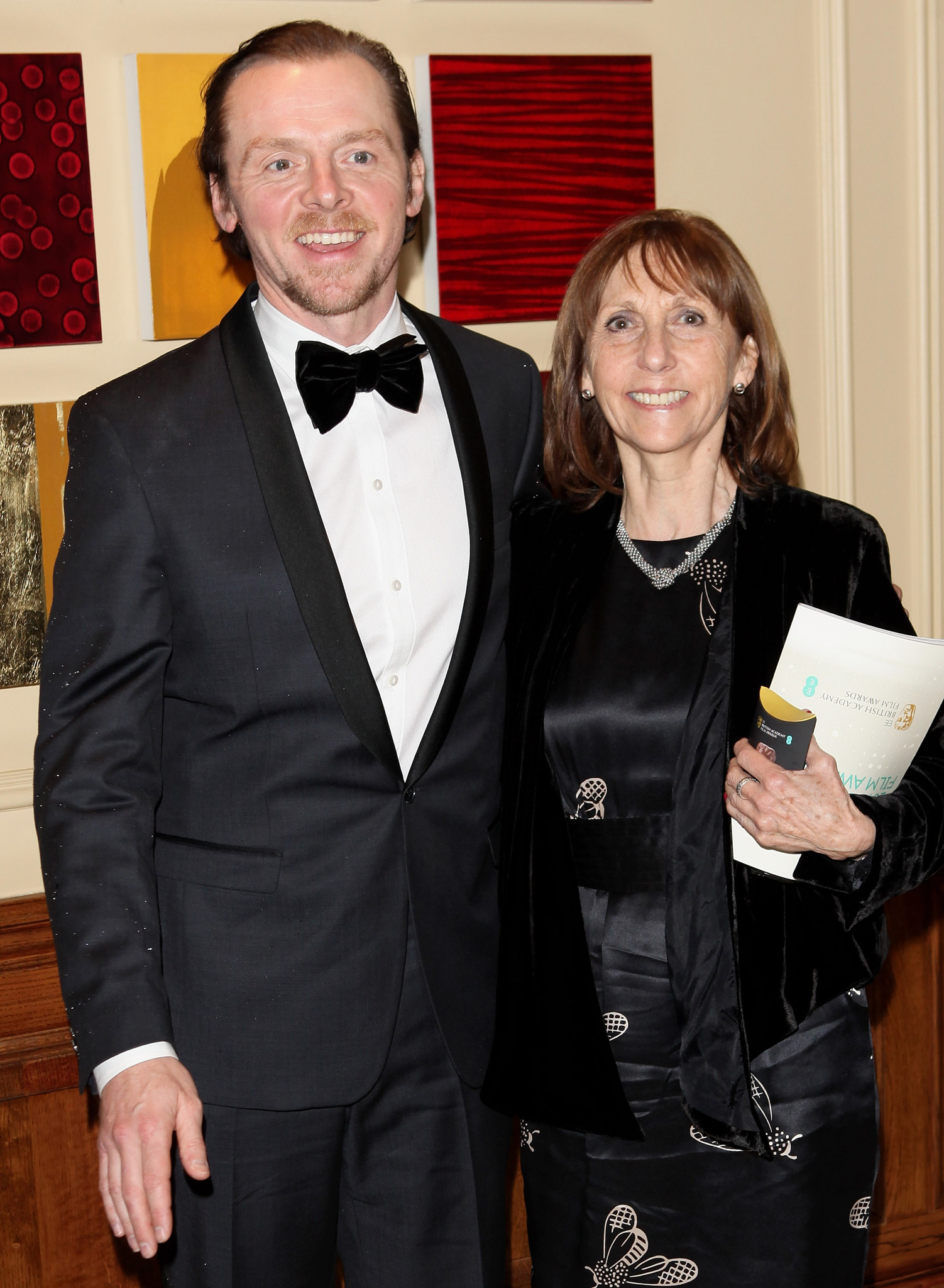 Simon Pegg (L) and mother Gillian arrive at the after party following the EE British Academy Film Awards at Grosvenor House on February 10, 2013 in London, England.