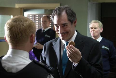 Still of Timothy Dalton and Simon Pegg in Hot Fuzz (2007)