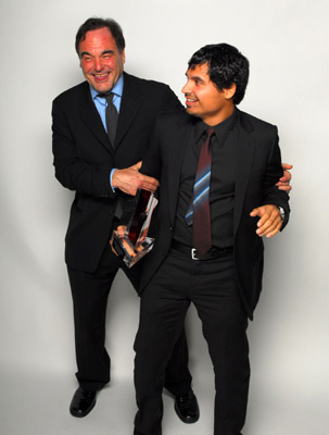 Oliver Stone and Michael Peña