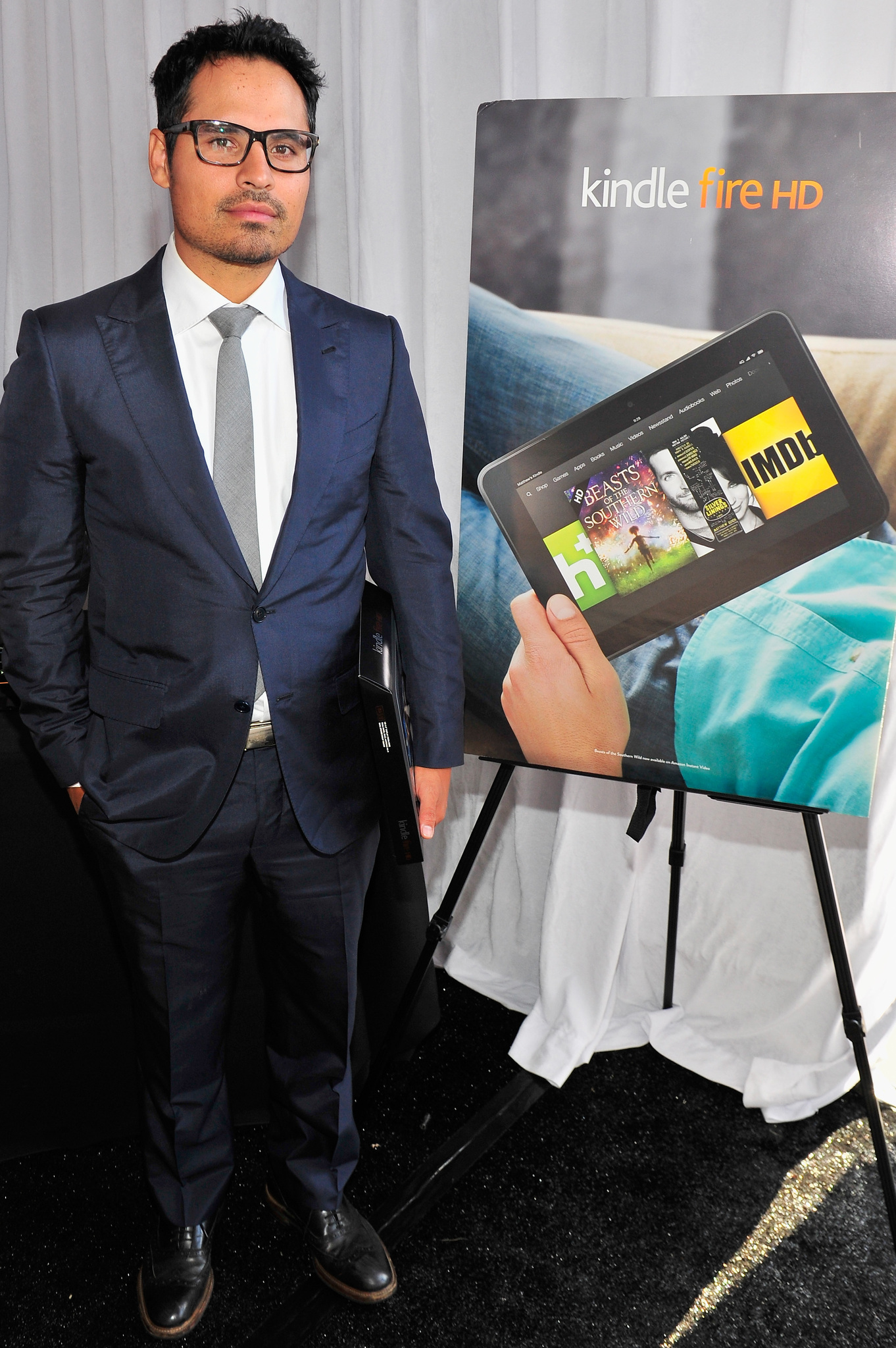 Michael Pena poses in the Kindle Fire HD and IMDb Green Room during the 2013 Film Independent Spirit Awards at Santa Monica Beach on February 23, 2013 in Santa Monica, California.
