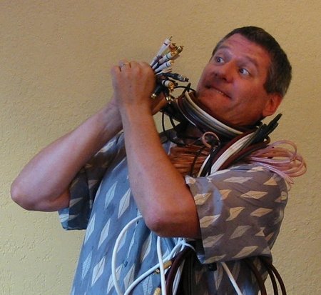 Radames wrestling with Home Theater wires... Don't worry, he always gets the best of them.