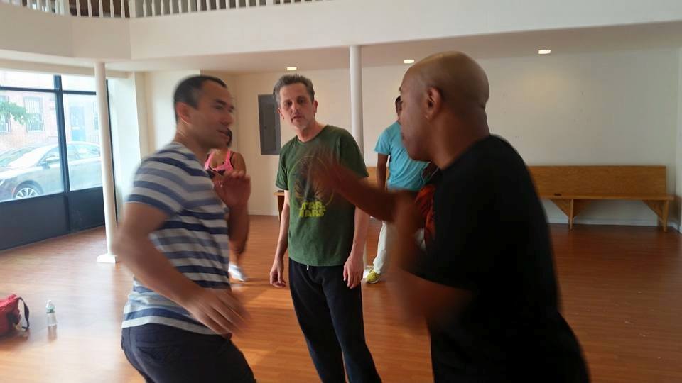 Here working out some fight choreography with Director Robert Samuels on the set of 