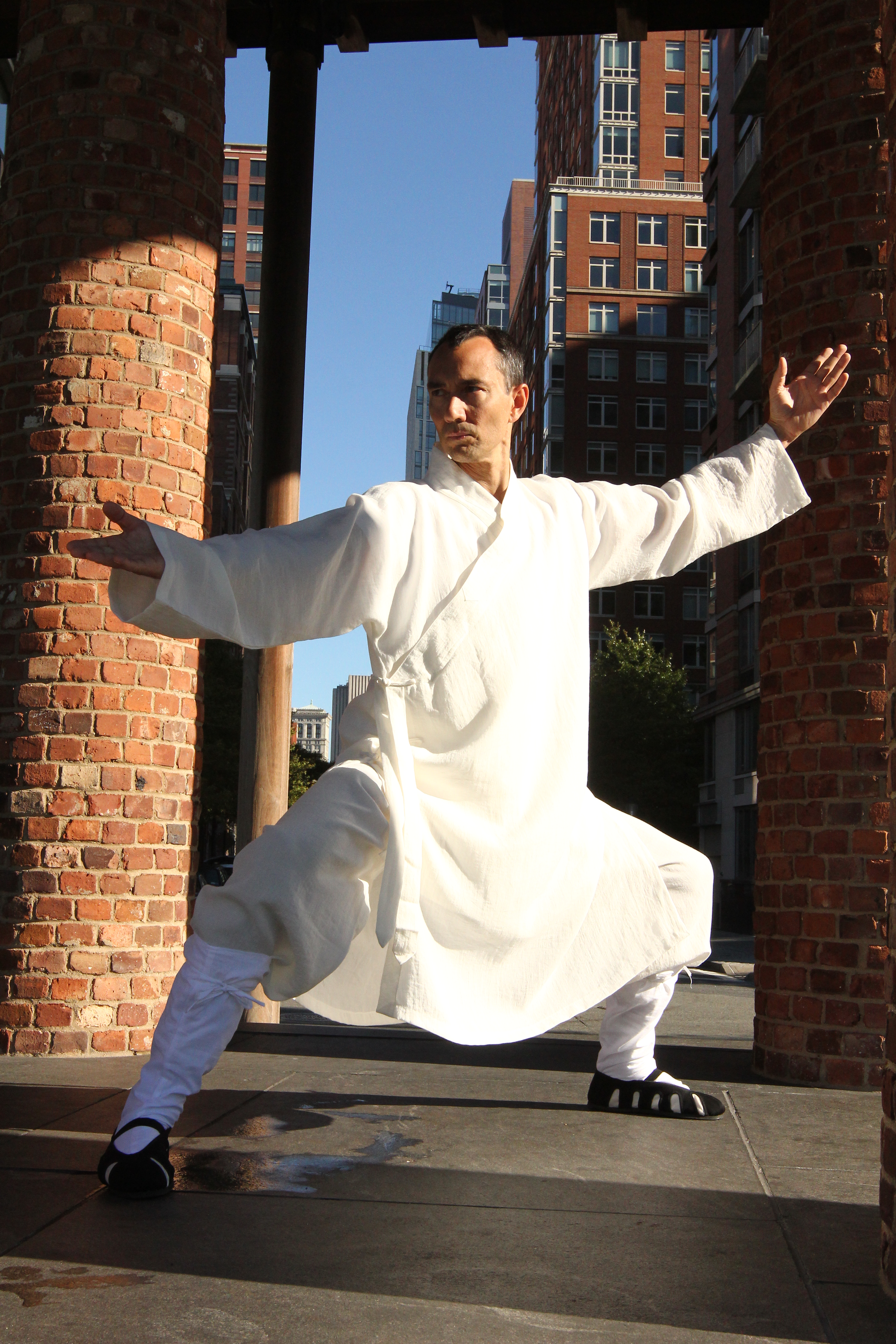Sifu Lyn in full Wudang regalia with the backdrop of TriBeCa, NYC