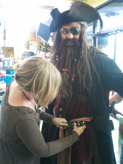 Adjusting detail on Pirate Costume designed for Colorado Lottery commercial