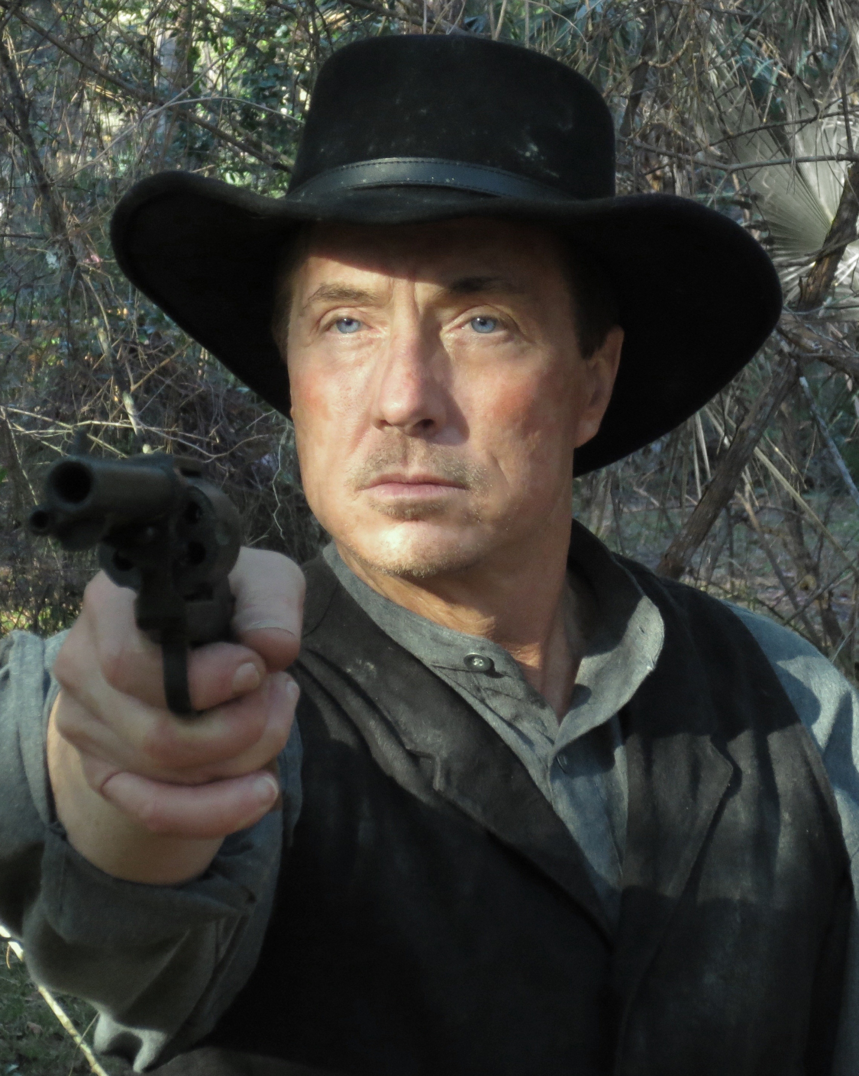Lee Perkins as Jim Simmons (The Gunslinger) in INJUN.