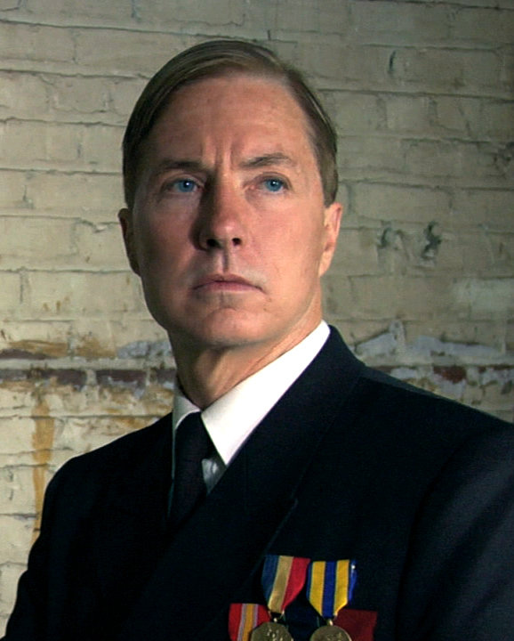 Lee Perkins as Lt. F. Ellis Coburn