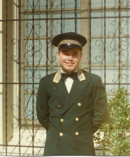 John Richard Petersen as the Doorman in 