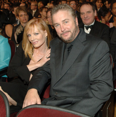 Marg Helgenberger and William Petersen