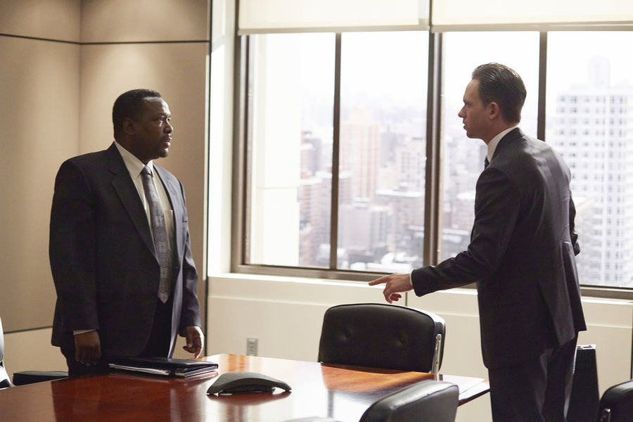 Still of Wendell Pierce and Patrick J. Adams in Suits (2011)