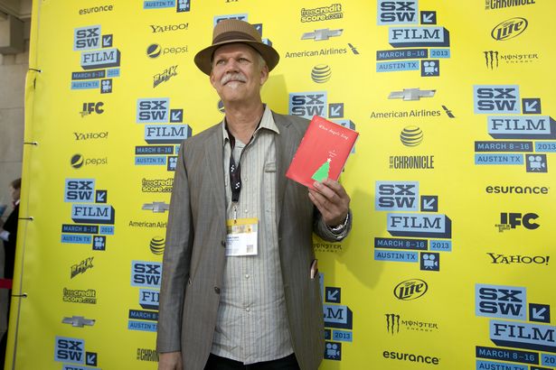 Turk Pipkin with his novel When Angels Sing at the SXSW World Premiere of Angels Sing.