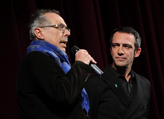 Festival director Dieter Kosslick and Rafi Pitts speak on stage ahead of the 'Jafar Panahi - Filmmaker Of The World' Premiere during day two of the 61st Berlin International Film Festival at the Berlinale Palace on February 11, 2011 in Berlin, Germany.
