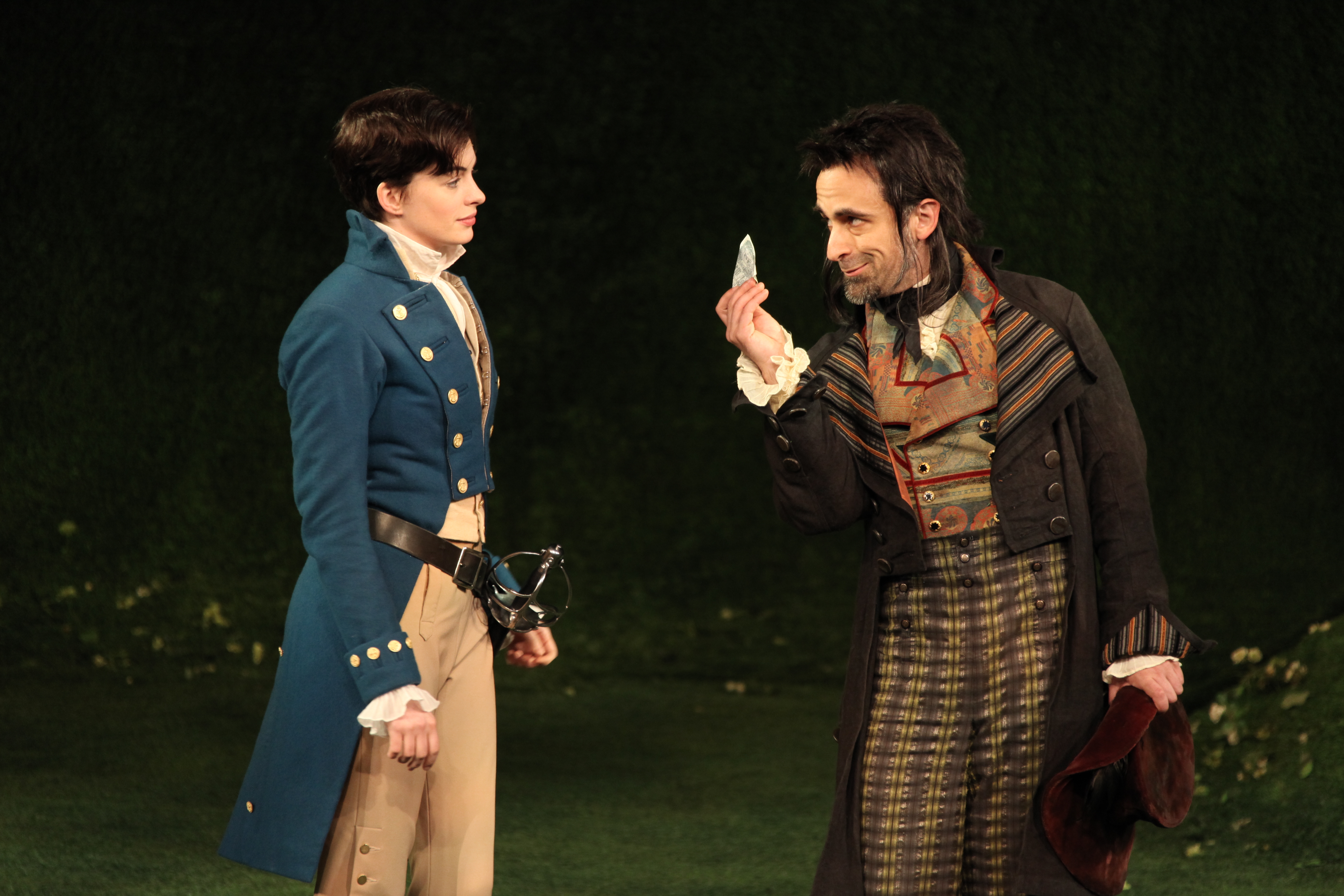 Anne Hathaway as Viola and David Pittu as Feste in Twelfth Night directed by Daniel Sullivan at the Delacorte, Summer 2009