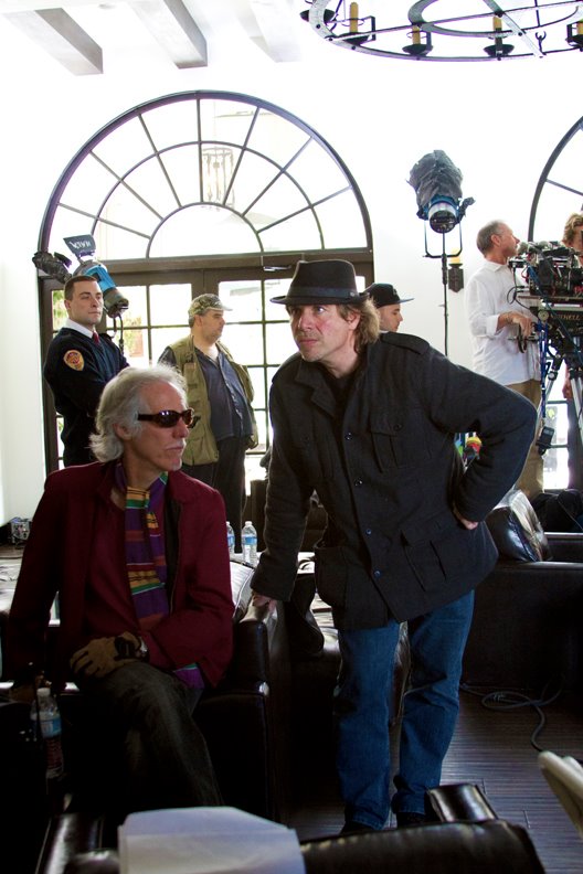 Producers John Densmore and Ed Polgardy study the action on the set of WINDOW OF OPPORTUNITY