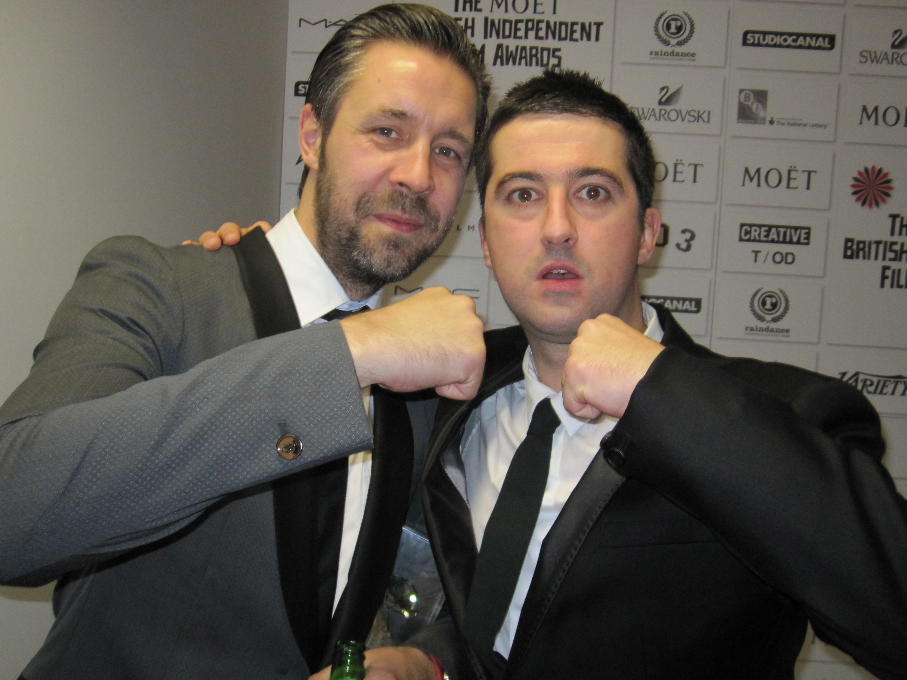 Paddy Considine & Paul Popplewel celebrate winning Best Film for 'Tyrannosaur' at The British Independent Film Awards