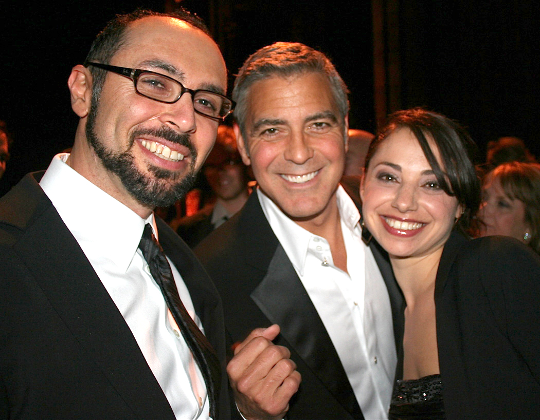 Yoav Potash celebrates at the 2012 National Board of Review Awards with actor George Clooney and Yoav's wife Shira. Potash received NBR's Freedom of Expression Award for his documentary 