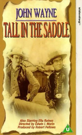 John Wayne and Frank Puglia in Tall in the Saddle (1944)