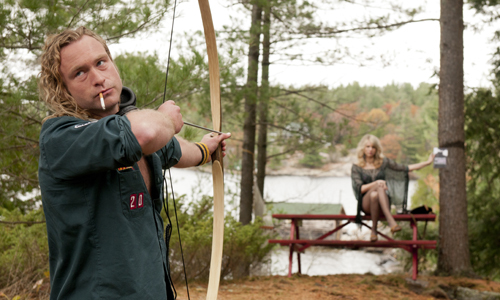Still of Dan Petronijevic and Lucy Punch in Cottage Country (2013)
