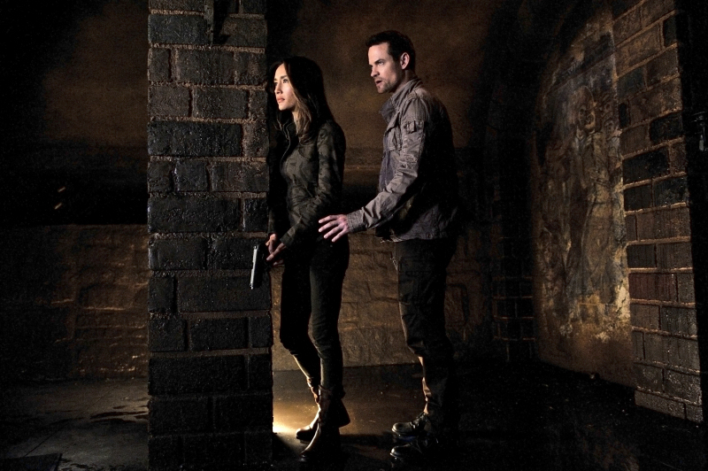 Still of Ben Mark Holzberg and Maggie Q in Nikita (2010)