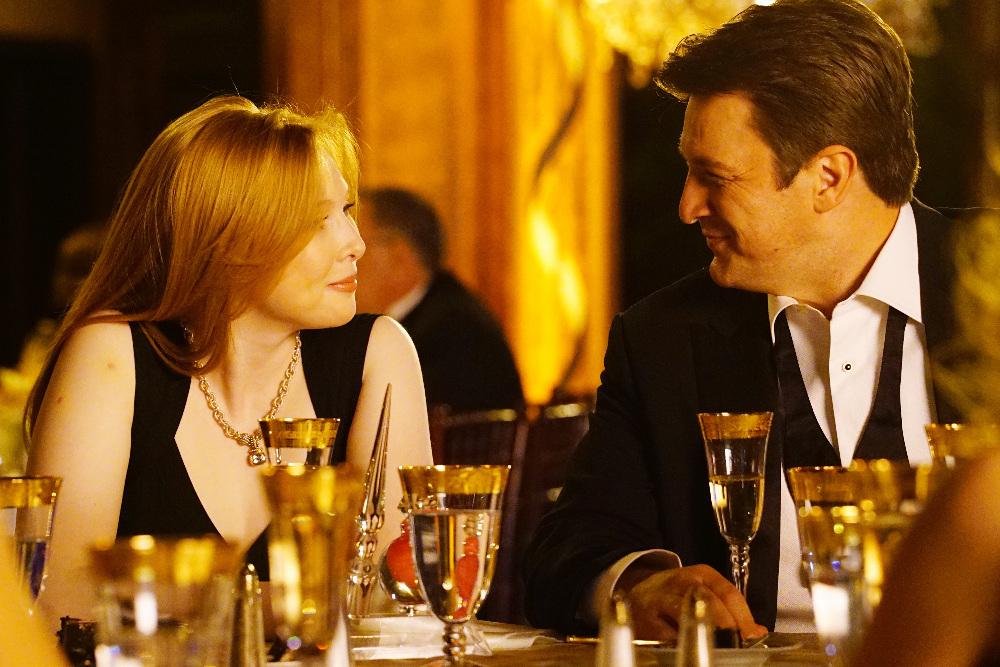 Still of Nathan Fillion and Molly C. Quinn in Kastlas (2009)