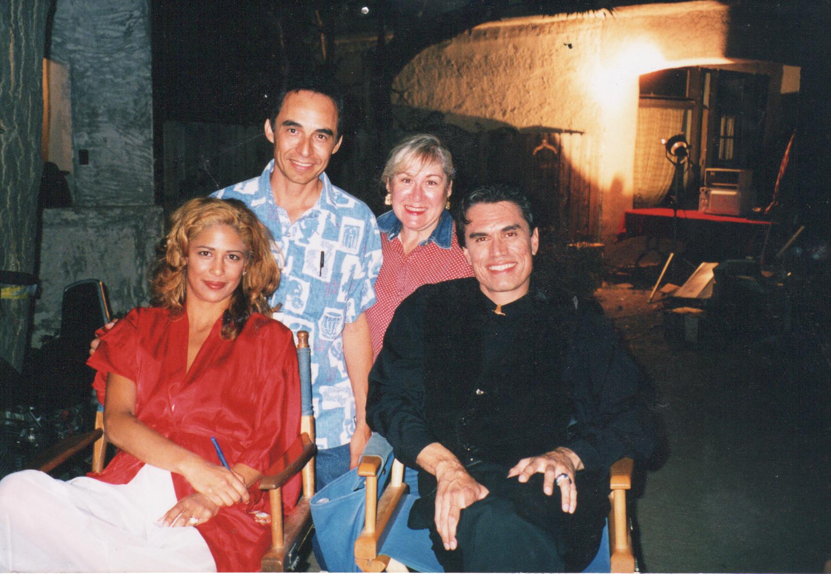 On set of BLACK DAWN with stars Catherine Lazo and Marco Rodriguez sitting and Rudy Quintanilla and Alice Flores standing.